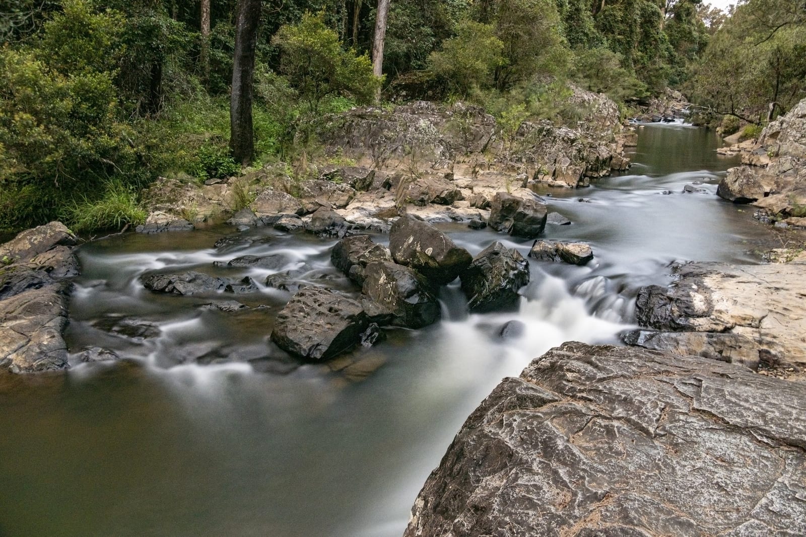 Broken River tumbling over rocks through the rainforest at Eungella